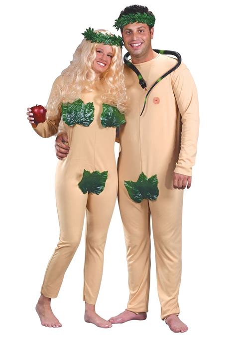 Two People Dressed In Costumes Standing Next To Each Other One Man Is