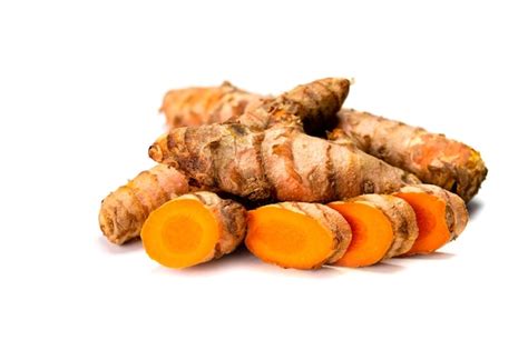 Premium Photo Fresh Turmeric Roots And Slices On White