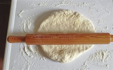 Rolling Pin On The Dough Giving The Dough The Desired Shape Roll Out