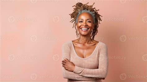 Happy Mature African Woman Smiling Cheerfully Embracing Her Natural