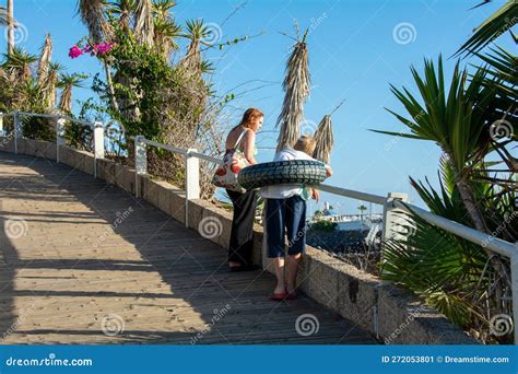 Footpath With People From Torviscas Playa Beach In Costa Adeje Tenerife Spain Stock Image