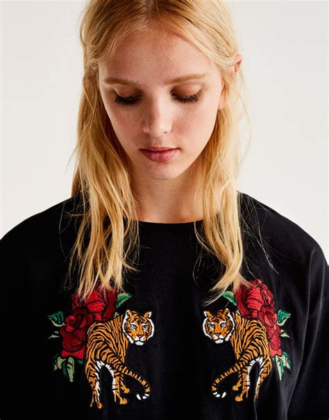T Shirt With Tiger Patches T Shirts Clothing Woman Pullandbear United Kingdom Swaggy