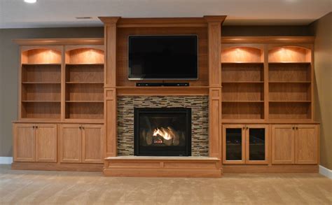 Fireplace Unit Surrounded By Custom Wall Built Ins Built In Around