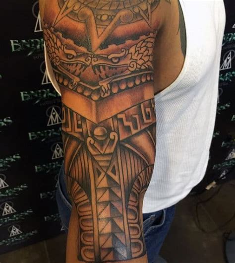Hawaiian tribal tattoos for men on shoulder and half sleeve. 80 Aztec Tattoos For Men - Ancient Tribal And Warrior Designs