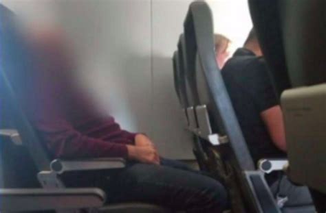 a frontier airlines passenger was caught urinating on the seat in front of him after being moved