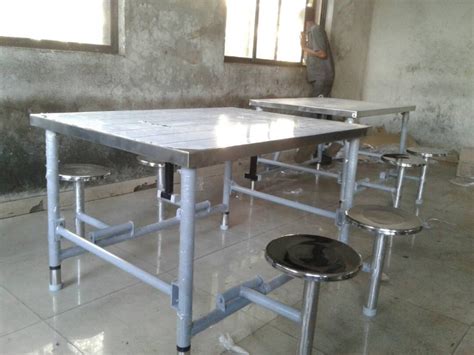 Get contact details and address | id: Kaarmik Stainless Steel 4 Seater Folding Seat Dining Table, Rs 9800 /piece | ID: 20671199491