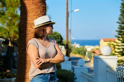Portrait Of Mature Beautiful Smiling Woman On Vacation Summer Tropical