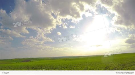 Sun And Clouds Over Fields Timelapse Uhd Stock Video Footage 7506074
