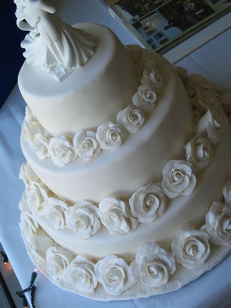 Maybe you would like to learn more about one of these? white roses wedding cakes | A Wedding Cake Blog