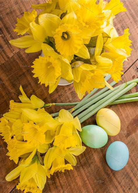 Easter Eggs And Yellow Daffodils High Quality Holiday Stock Photos