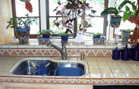 Interesting fact is that often utilized for talavera color pallet. Mexican Tiles on a Kitchen Counter | Hacienda style ...
