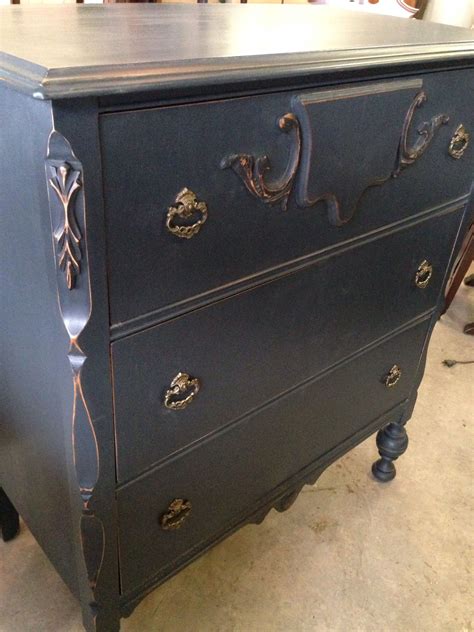 Try a bold color to turn an old eyesore into an artist's. Black painted dresser | Black painted dressers, Painted ...