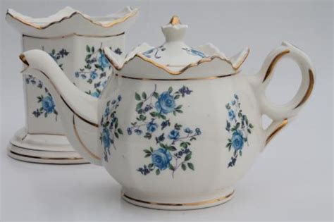 Large collections of teapot warmers at great bargain prices. vintage flowered china teapot w/ candle warmer stand ...