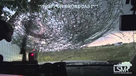 Storm Chasers Capture Footage Of Hail Demolishing Their Windshield