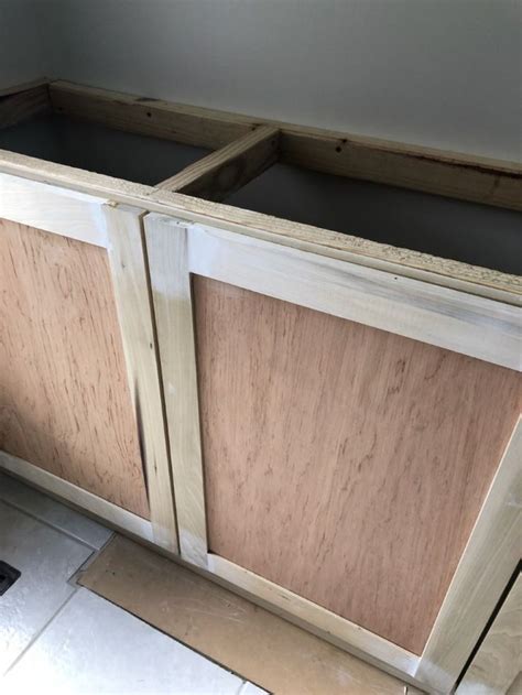 These diy shaker style cabinet doors were built for the laundry room for only $2 each with some left over beadboard. DIY Kitchen Cabinets for Under $200 - A Beginner's ...