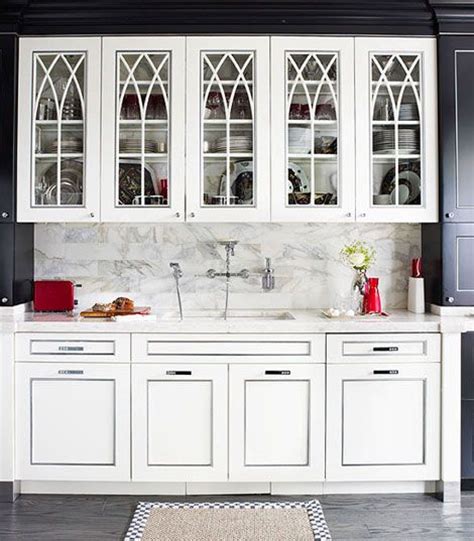 Do you think kitchen wall cabinets with sliding doors seems great? White Kitchen Cabinets with Gothic Arch Glass-Front Doors ...