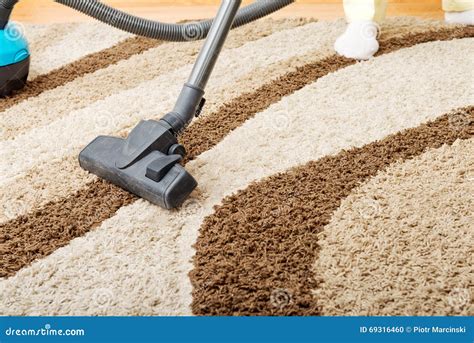 Senior Woman Vacuuming Carpet At Home Stock Photo Image Of Couch