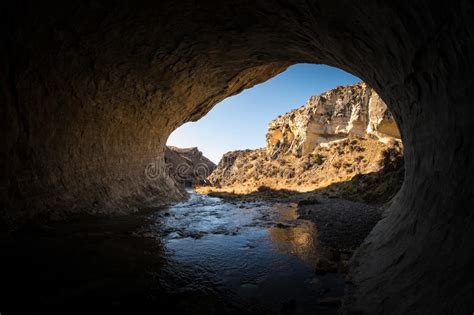 An Underground Mountain River Flowing In A Cave Stock