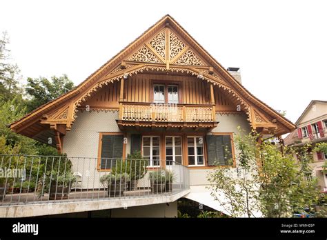 A Traditional Swiss House With Lattice Work In The Capital City Of Bern