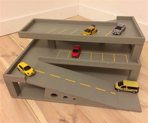 A visitor requested plans for one that he had seen on the internet. Toy Parking | Speelgoed garage maken, Diy houten speelgoed, Houten speelgoed