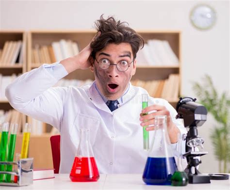 Mad Crazy Scientist Doctor Doing Experiments In A Laboratory Stock