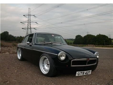 Flat Caps And Driving Gloves A Lot Of Love For The Mgb Retro Rides
