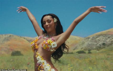 Doja Cat Runs Topless Through A Meadow In New Post Malone Music Video For Their Single I Like You