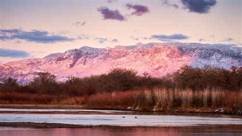 Albuquerque Sunset Paints The Sandia Mountains With The Rio Grande In
