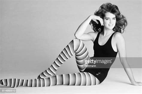 Brooke Sheilds Models A Pair Of Striped Tights And A Black Leotard By