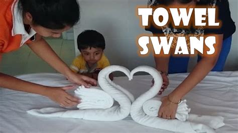 The making process is quite easy to follow. How to make Towel art | Towel Origami Swans | Towel ...
