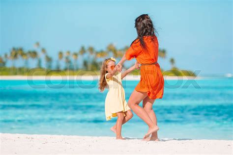 Beautiful Mother And Daughter At Caribbean Beach Enjoying Summer Vacation Stock Image Colourbox