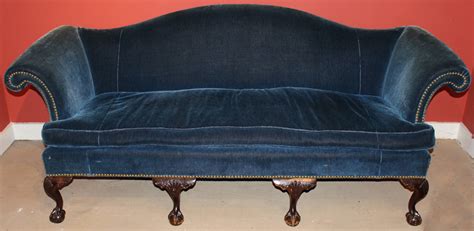 This beautiful sofa is upholstered in a durable yellow fabric and comes with 5 matching throw pillows. Chippendale Style Camelback Centennial Sofa with ball and ...