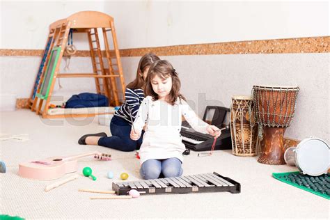 Cute Girl Playing On The Xylophone Stock Image Colourbox