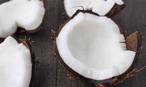 how to crack open and use a whole coconut delightful adventures