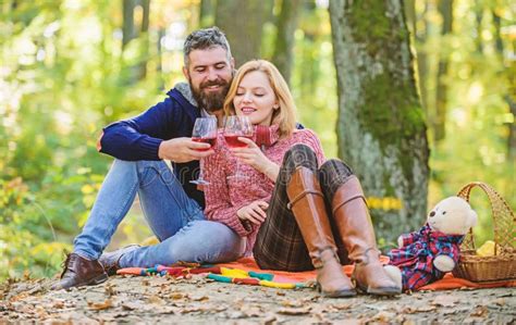 romantic picnic with wine in forest couple in love celebrate anniversary picnic date stock