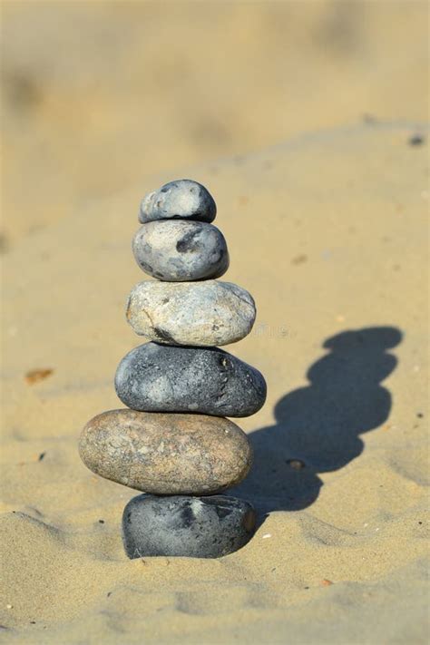 Zen Stones Stacked On Sand Stock Photo Image Of Stacked 75508742