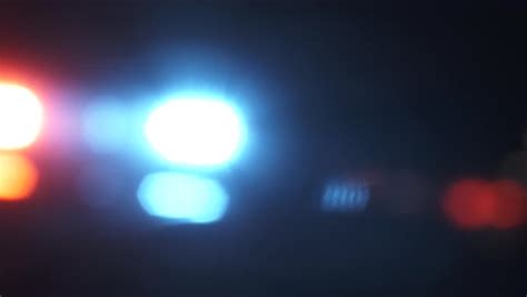 Soft Focus On Bright Red And Blue Flashing Lights From Emergency