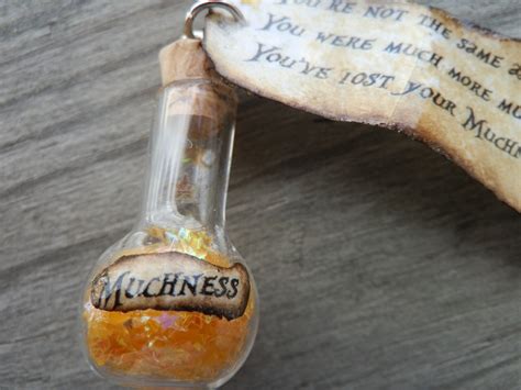 Who in the world am i? Alice In Wonderland Muchness In A Bottle And Tag Pendant