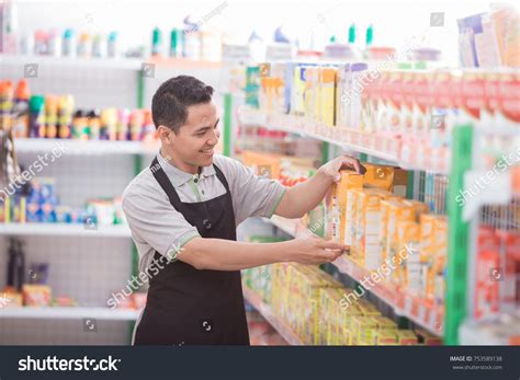 Asian Male Shopkeeper Working Grocery Store Stock Photo 753589138