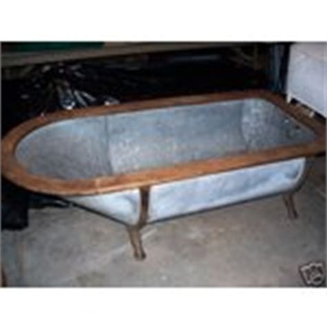 Each of these found, vintage items is unique. antique cowboy galvanized bathtub (04/26/2007)