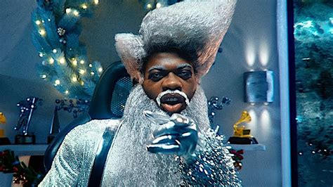 Now, let him corrupt your soul. Lil Nas X transforms into Santa Claus in 'Holiday' music video