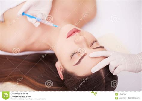 Injection And Woman Beauty Face Attractive Girl With Perfect Skin