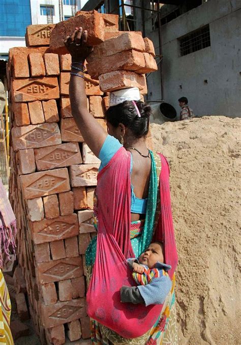 It's not cancerous and doesn't usually hurt, but your doctor should check to be sure. Image shows woman carrying bricks on head and baby on back ...