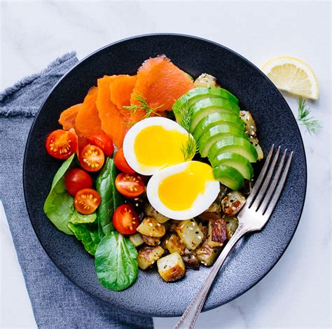 Once you discover how to smoke salmon with this easy and a fraction of the price for what you'd be paying at a breakfast/brunch when dining out. Soft Boiled Egg and Smoked Salmon Breakfast Bowl - Reclaiming Yesterday