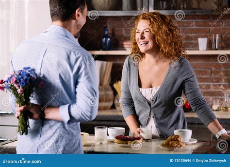 Man Holding Bunch Of Flowers Behind Back Stock Photo Image Of