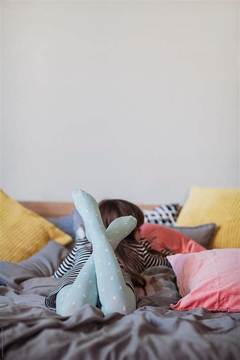 A Girl Lying On A Bed By Stocksy Contributor Lumina Stocksy