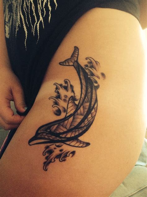 love my newest tattoo tribal style dolphin on my hip upper thigh tribal tattoos dolphins