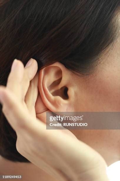 Mature Woman Cupping Ear Photos And Premium High Res Pictures Getty