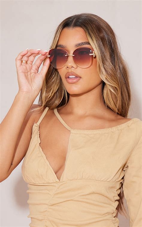 brown faded round frame frameless sunglasses prettylittlething