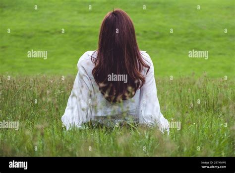 Girl Sitting Alone Back Nature High Resolution Stock Photography And